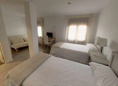 Cama o camas de una habitación en El Mirador de Candelario