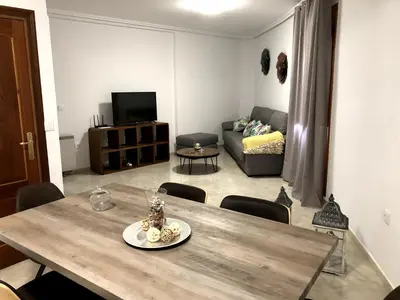 Una televisión o centro de entretenimiento en Apartamento SC Victoria