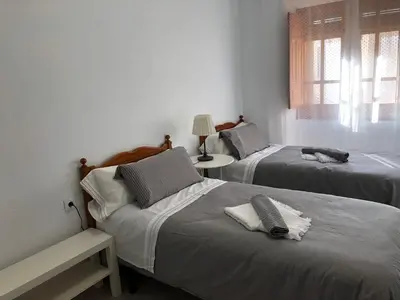 Cama o camas de una habitación en Apartamento SC Victoria