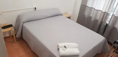 Cama o camas de una habitación en Plaza de España