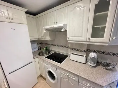 Una cocina o zona de cocina en Apartamento Reyes de España / Free Parking & Wi Fi