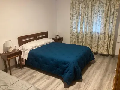 Cama o camas de una habitación en Apartamento Turístico Cervantes 18