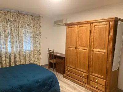 Cama o camas de una habitación en Apartamento Turístico Cervantes 18