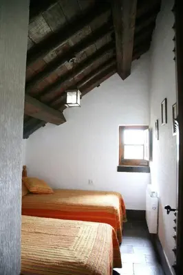 Cama o camas de una habitación en CASA TEO