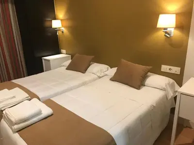Cama o camas de una habitación en Hotel Moya