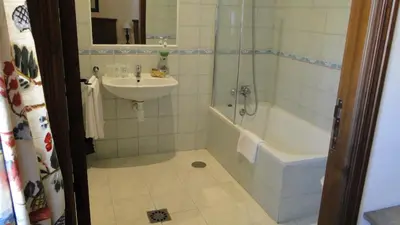 Un baño de Hostal Las Paneras
