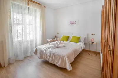 Cama o camas de una habitación en Apartamento Candela