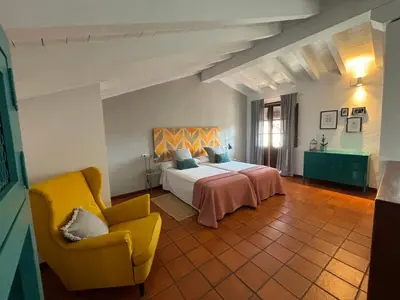 Cama o camas de una habitación en Alborada Apartamentos Rurales