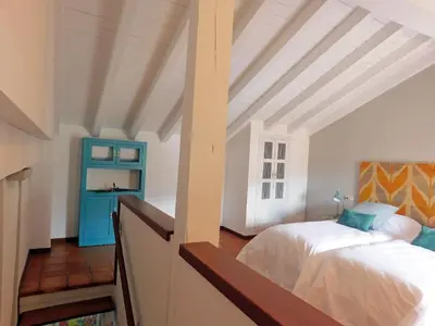 Cama o camas de una habitación en Alborada Apartamentos Rurales