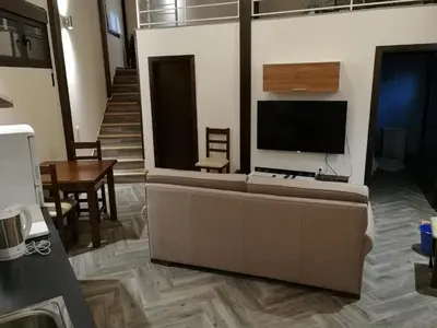 Una televisión o centro de entretenimiento en Apartamento La Sierra