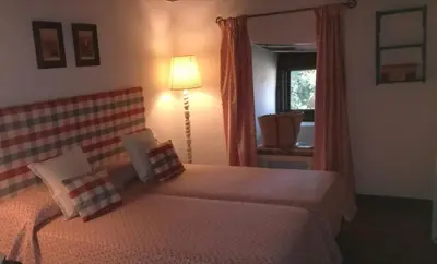 Cama o camas de una habitación en La Casita del Tejo