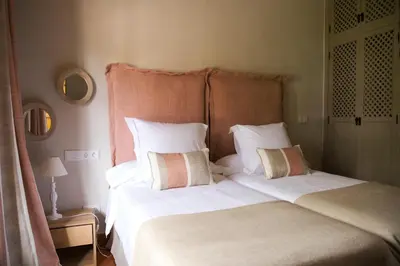 Cama o camas de una habitación en Hotel Rural Las Tejuelas
