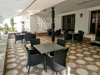 Zona de estar de Hotel Las Cigüeñas