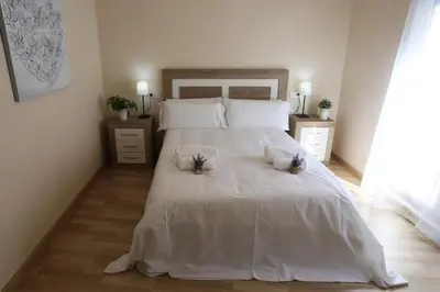 Cama o camas de una habitación en Apartamento Puente Romano P1-1B