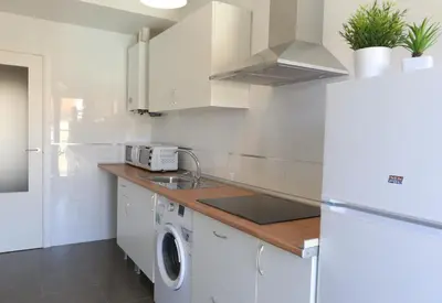 Una cocina o zona de cocina en Apartamento Puente Romano P1-1B