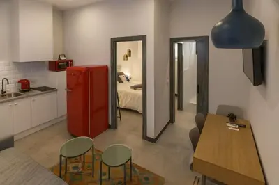 Una cocina o zona de cocina en TRIA NOMINA Apartamentos Turísticos