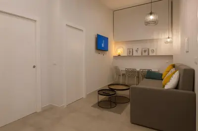 Zona de estar de TRIA NOMINA Apartamentos Turísticos