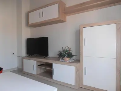Una televisión o centro de entretenimiento en Paneras del Rey