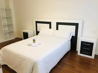 Cama o camas de una habitación en Apartamento turísticos Puente Romano P1 1-C