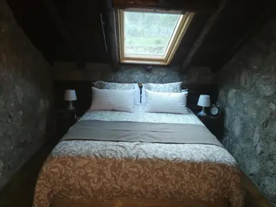 Cama o camas de una habitación en Casa rural La Borriquita