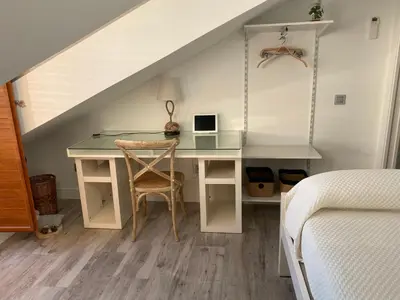 Cama o camas de una habitación en Alojamiento Museo Carmelitano Alba de Tormes