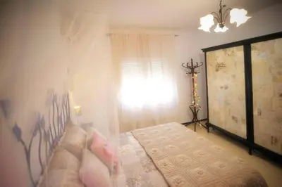 Cama o camas de una habitación en La Casina de Micaela