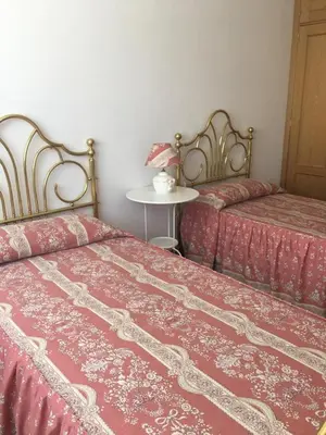 Cama o camas de una habitación en VUT sencilla y cómoda en Ávila capital.