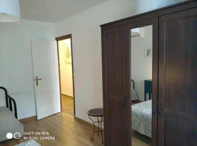 Cama o camas de una habitación en solaz del ambroz-Hervas