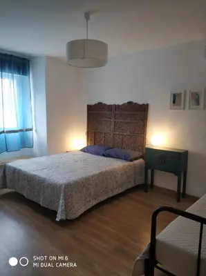 Cama o camas de una habitación en solaz del ambroz-Hervas