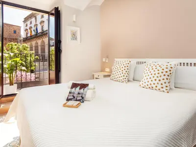 Cama o camas de una habitación en Apartamentos Plaza Mayor 35