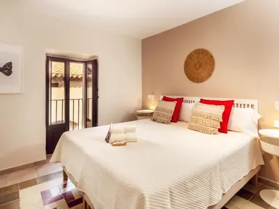 Cama o camas de una habitación en Apartamentos Plaza Mayor 35