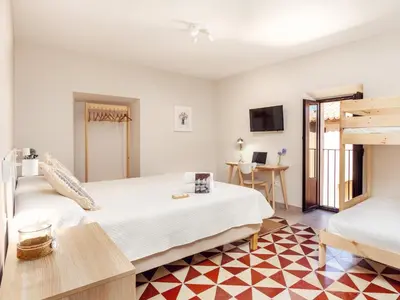 Cama o camas de una habitación en Apartamentos Plaza Mayor 35