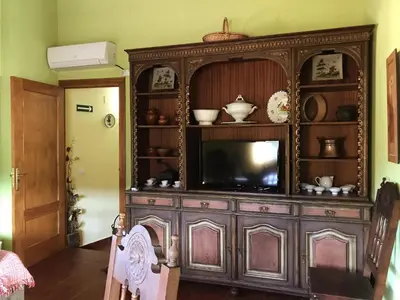 Una televisión o centro de entretenimiento en Casa Barrero