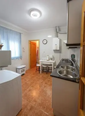 Una cocina o zona de cocina en casa familiar La Lunara