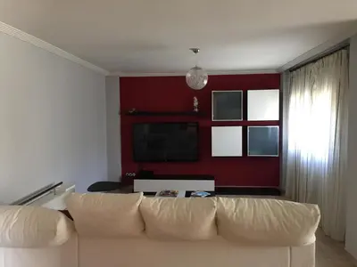 Una televisión o centro de entretenimiento en Villa Miranda