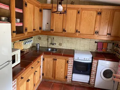 Una cocina o zona de cocina en Aventura II