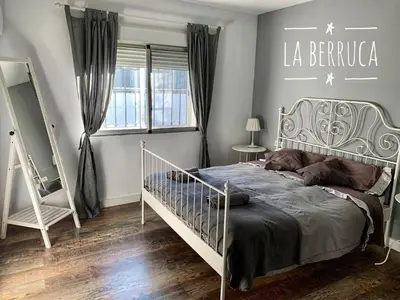 Cama o camas de una habitación en La Berruca Casa Rural Malpartida de Cáceres