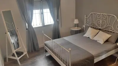 Cama o camas de una habitación en La Berruca Casa Rural Malpartida de Cáceres