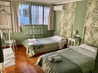 Cama o camas de una habitación en La Berruca Casa Rural Malpartida de Cáceres