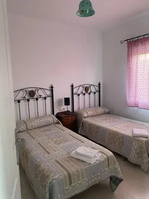 Cama o camas de una habitación en Casa rural Hnas Corral