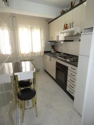 Una cocina o zona de cocina en APARTAMENTOS DAYMA