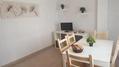 Una televisión o centro de entretenimiento en APARTAMENTOS DAYMA