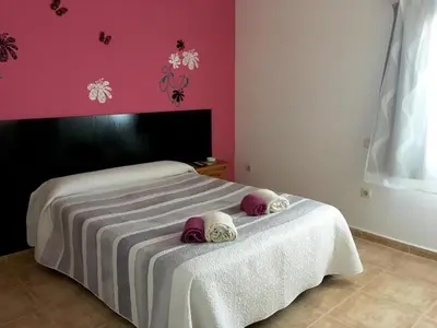 Cama o camas de una habitación en Hostal Catedritos Ibéricos A-5 Km 154 A 5 KM DE OROPESA A 1 KM DE HERRERUELA DE OROPESA