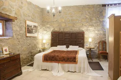Cama o camas de una habitación en Posada Palacio Manjabalago