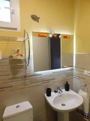 Un baño de APARTAMENTO ROMULO Y REMO-ROMULO