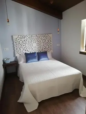 Cama o camas de una habitación en Casa Rural El Enebro 4 estrellas