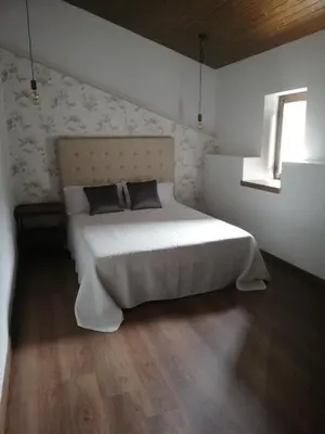 Cama o camas de una habitación en Casa Rural El Enebro 4 estrellas