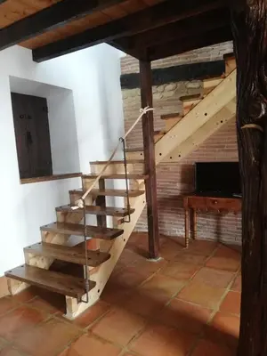 Una televisión o centro de entretenimiento en Casa Rural El Enebro 4 estrellas