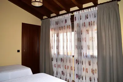 Cama o camas de una habitación en CASA RURAL VERSOS