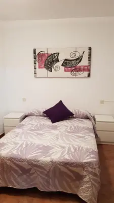 Cama o camas de una habitación en Apartamento turístico Dayma 2